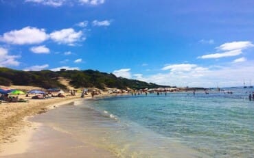 Playa d'en Bossa, Ibiza. Soft sands, clear waters, beautiful people and great beach bars - Salinas is the cool beach for those in the know.